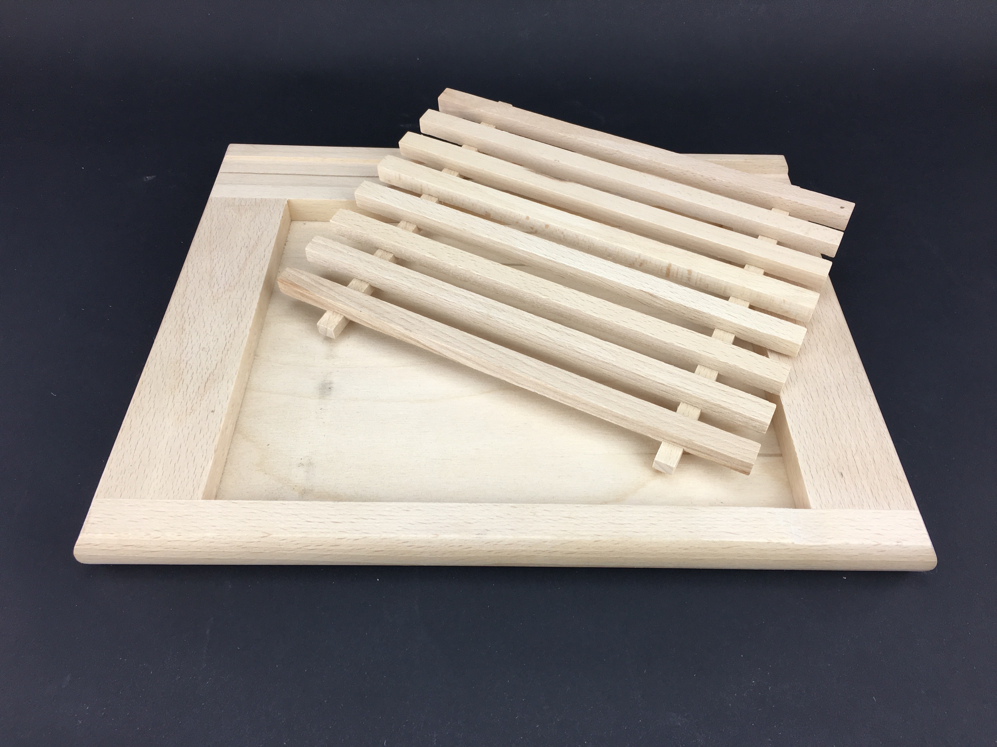 Wooden bread board with crumb catcher